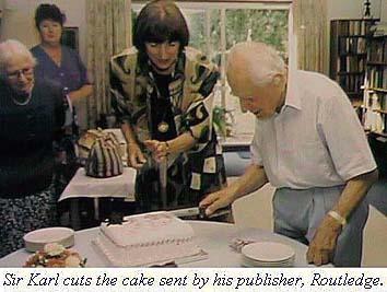 Photo: Popper cuts Birthday Cake